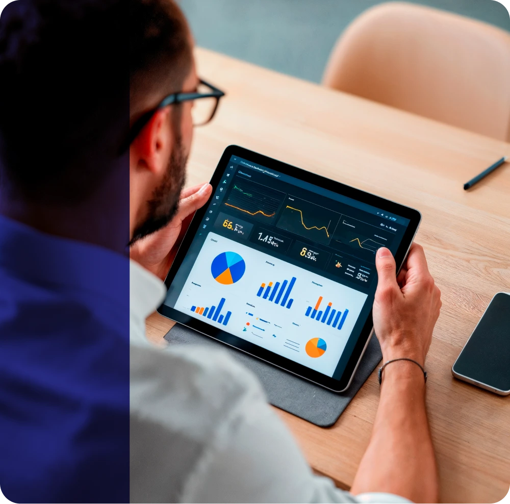 Modern laptop open on a desk with digital data visualization and corporate asset tracking tools.
